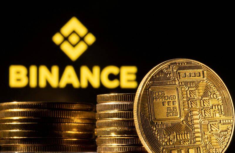 Illustration shows a representation of cryptocurrency and Binance logo