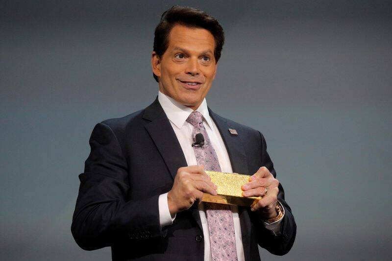 Anthony Scaramucci, Founder & Managing Partner of SkyBridge Capital, holds a gold bar while hosting the Skybridge Capital SALT New York 2021 conference in New York
