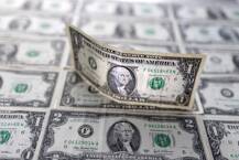 Dollar gains after strong New York factory survey